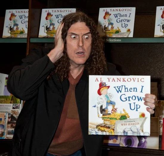 monstersandcritics.com "Weird Al" looks flabbergasted that he is the author of a Dr. Seuss-esque children's book, "When I Grow Up."