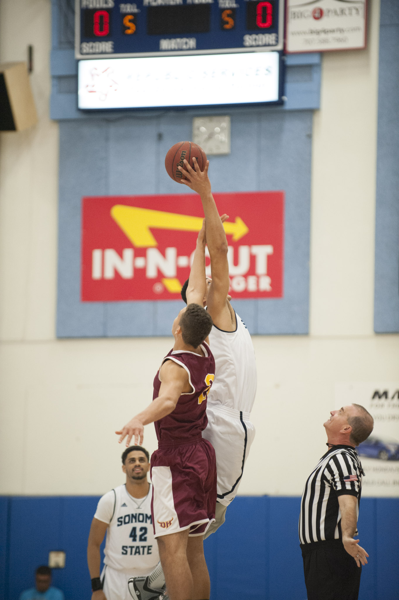 STAR // Connor Gibson Sophomore center Nathan Molony-Benjamin elevates during tip-off.