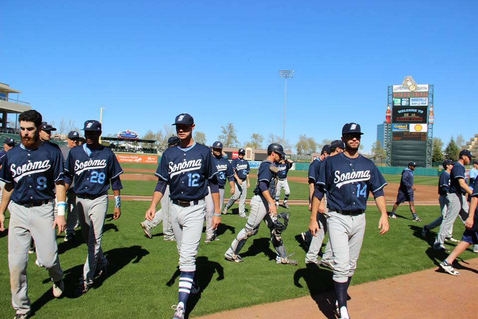 facebook.com The baseball team lines up for the National Anthem at Raley Field in Sacramento. The team enters the dugout before the start of the game.
