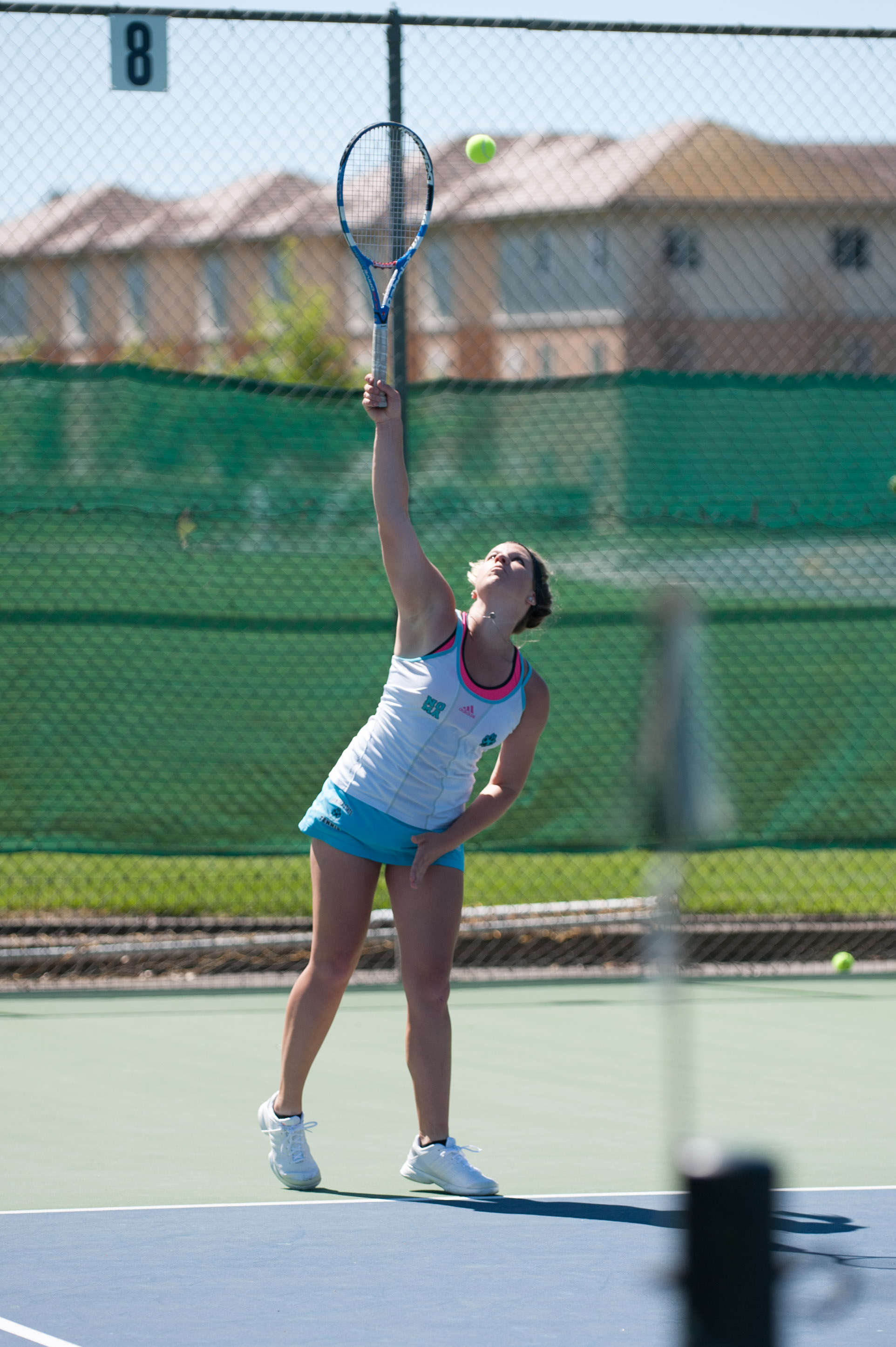 STAR // Connor Gibson Sophomore Kaitlyn Haithcock eyes the ball before her serve.