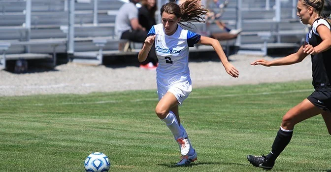 Sophmore Sara Van Wagoner advances on the Cal State L.A. defender during the team’s draw.