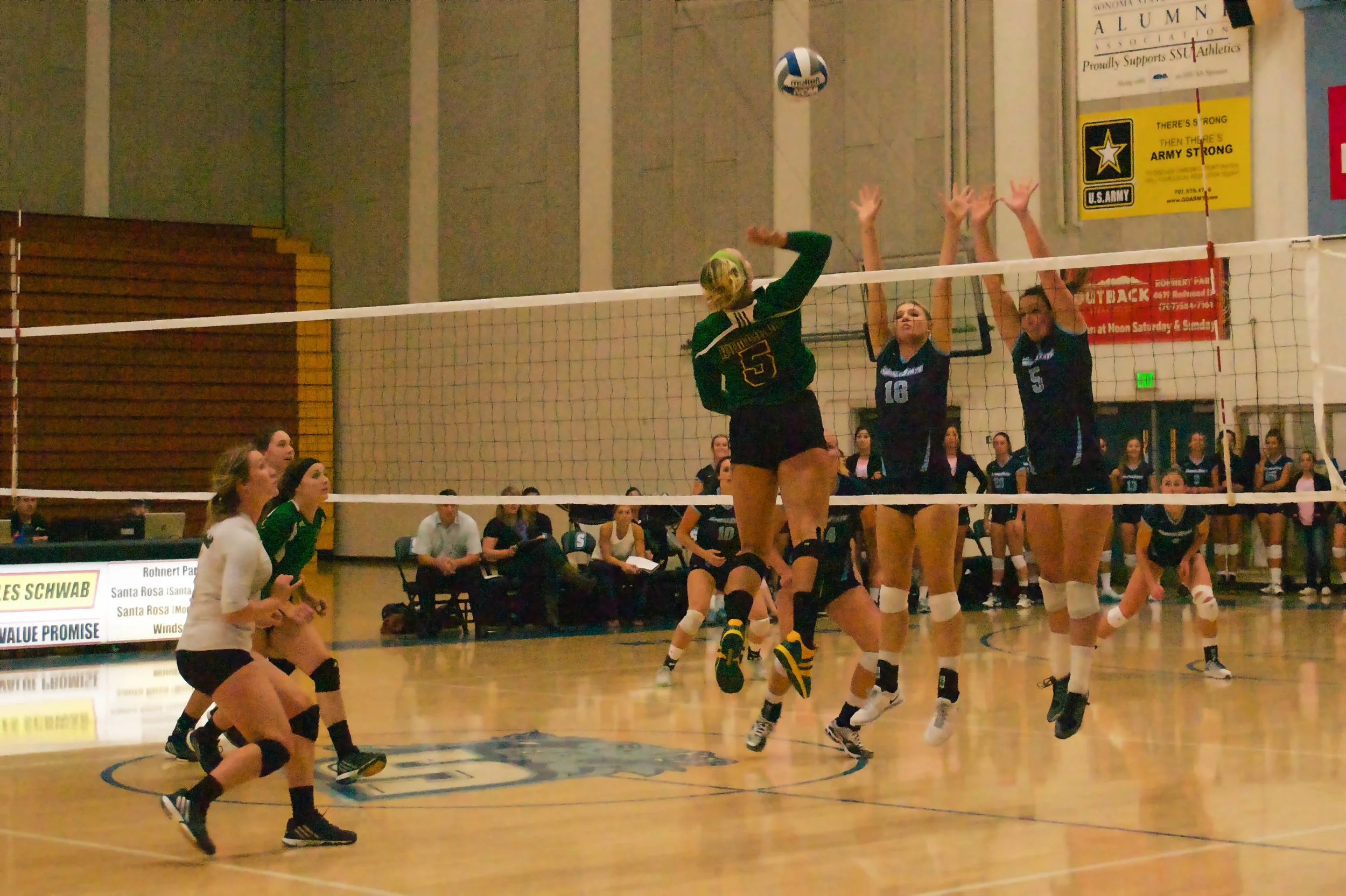 STAR// Nicole Detmers Senior Caylie Seitz and junior Rachel Andrews go for the block against visiting HSU. 