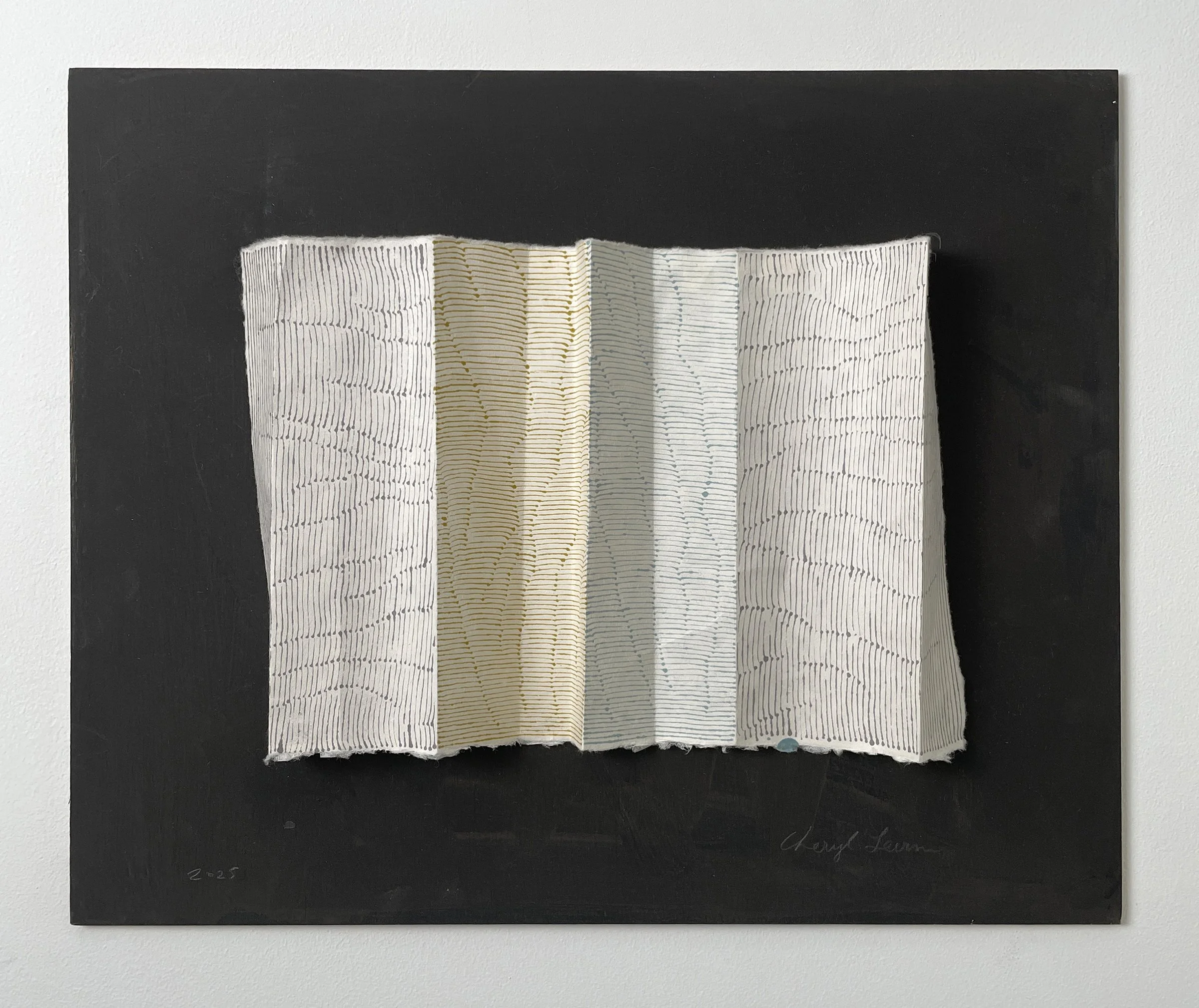 Folded Paper with Lines in Different Colors or With a Wave of the Hand 