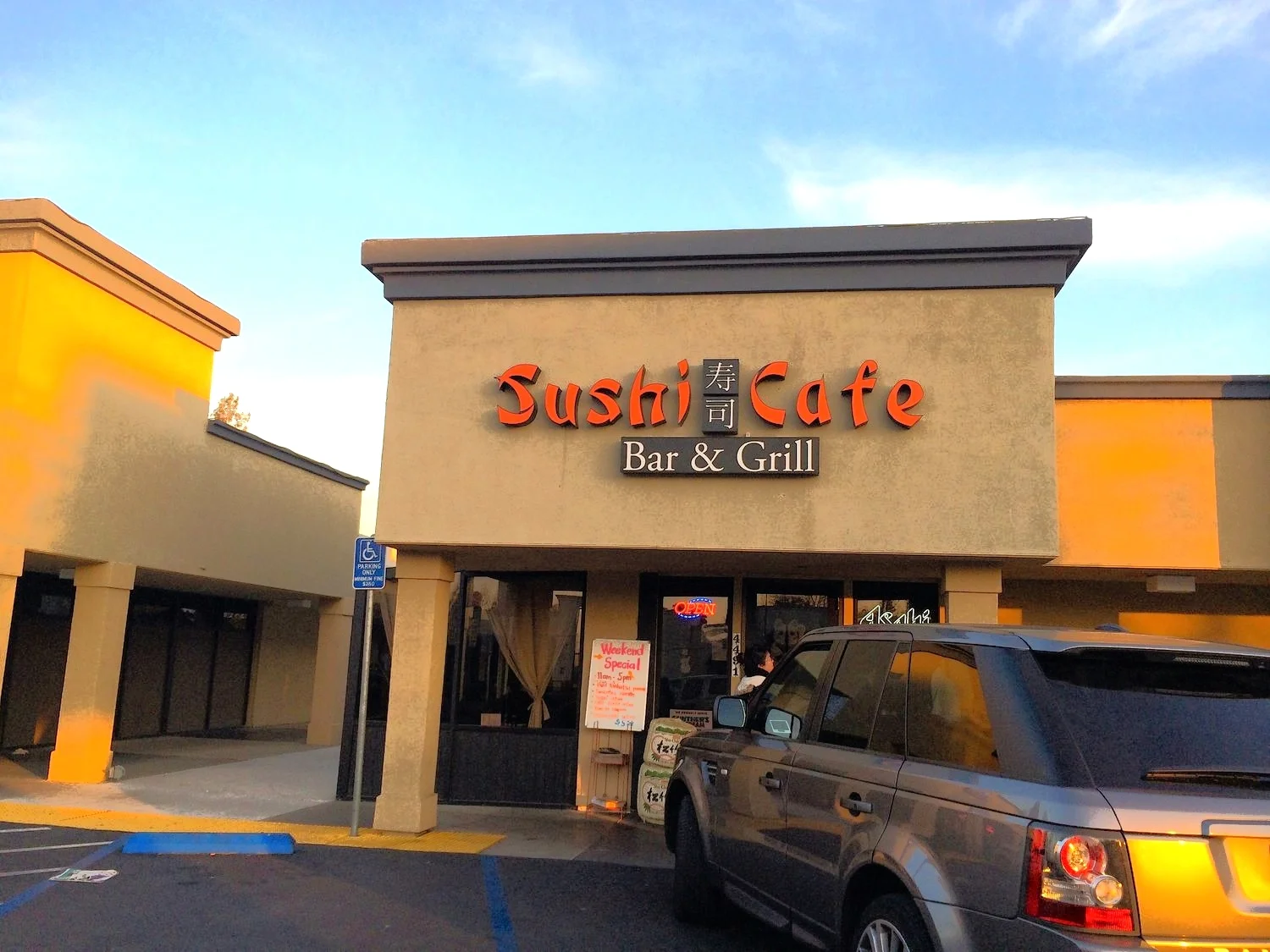 Beautiful sunset - Sushi Cafe front Photos by Tony XQ Chen