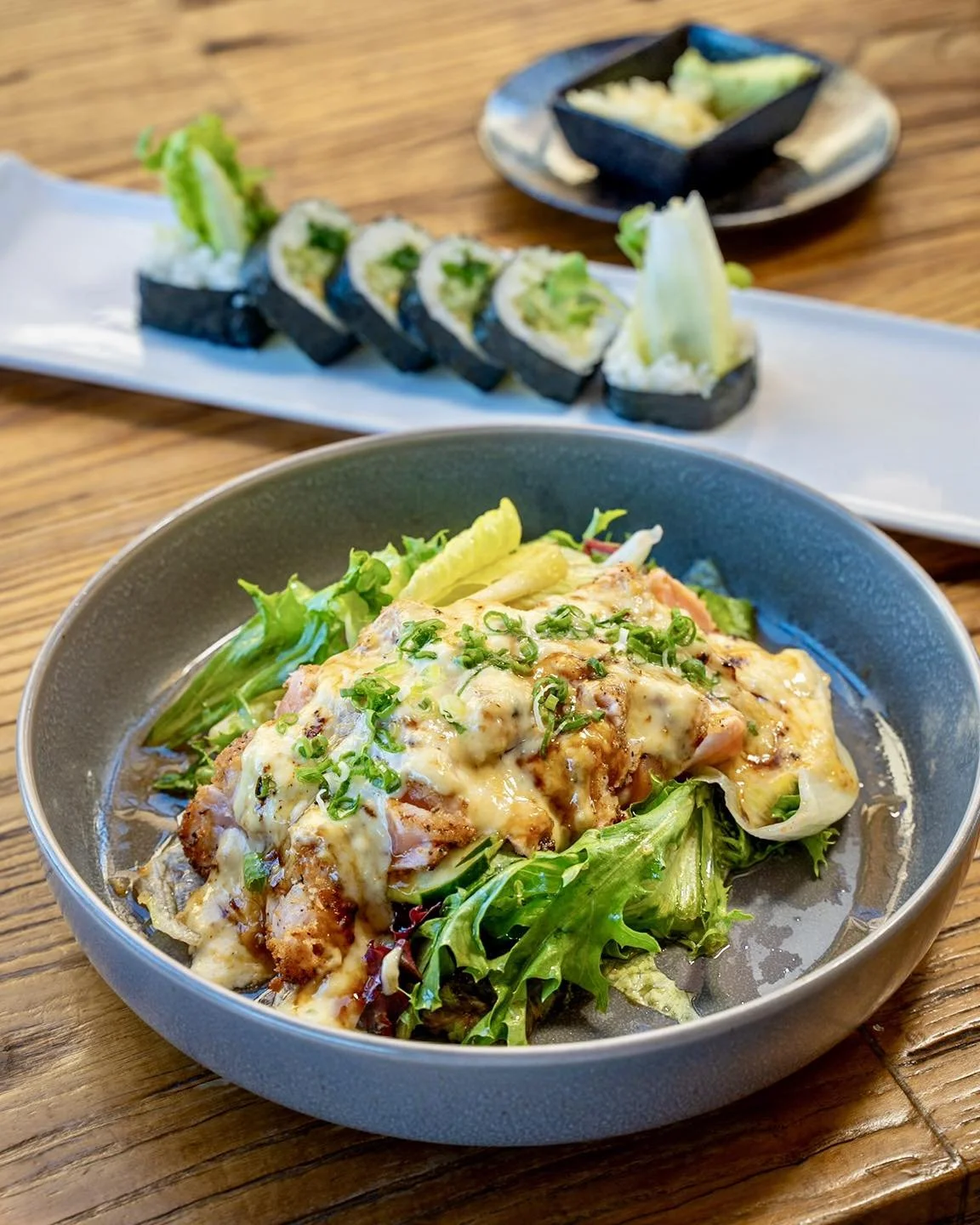 On these hot days - our Seared Salmon Salad is the perfect dish to enjoy, and don&rsquo;t forget a sushi roll on the side 🤗

✨Seared Salmon Salad✨
seared crispy salmon w/ garlic sauce &amp; spring mix

For more fun dishes, visit our website to see o