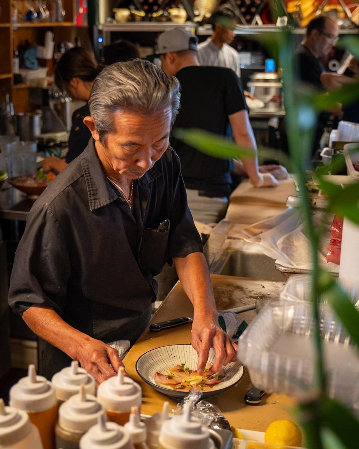 One of the best seats in the house, has to be at our sushi bar with Chef Sa and the crew 🍣 You can get a perfect view of them doing what they do best- and as a bonus - you might hear some funny jokes from Chef too 😎 Swipe to see the dish he&rsquo;s