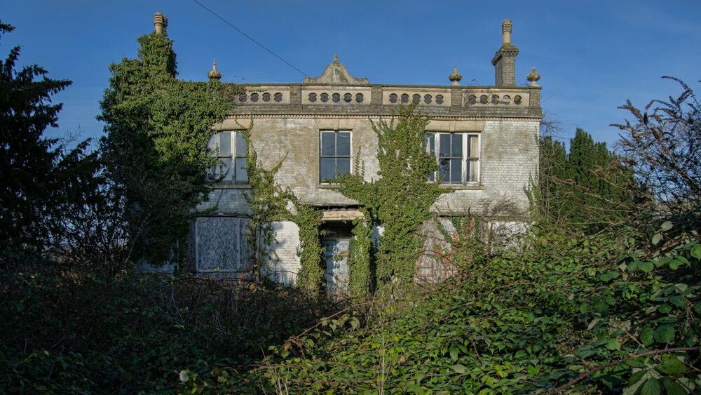 I have paid a couple of visits to this small abandoned manor house as it is often on my way home at weekends. Never had any luck with access but the crazy overgrowth makes it well worth an external shot.