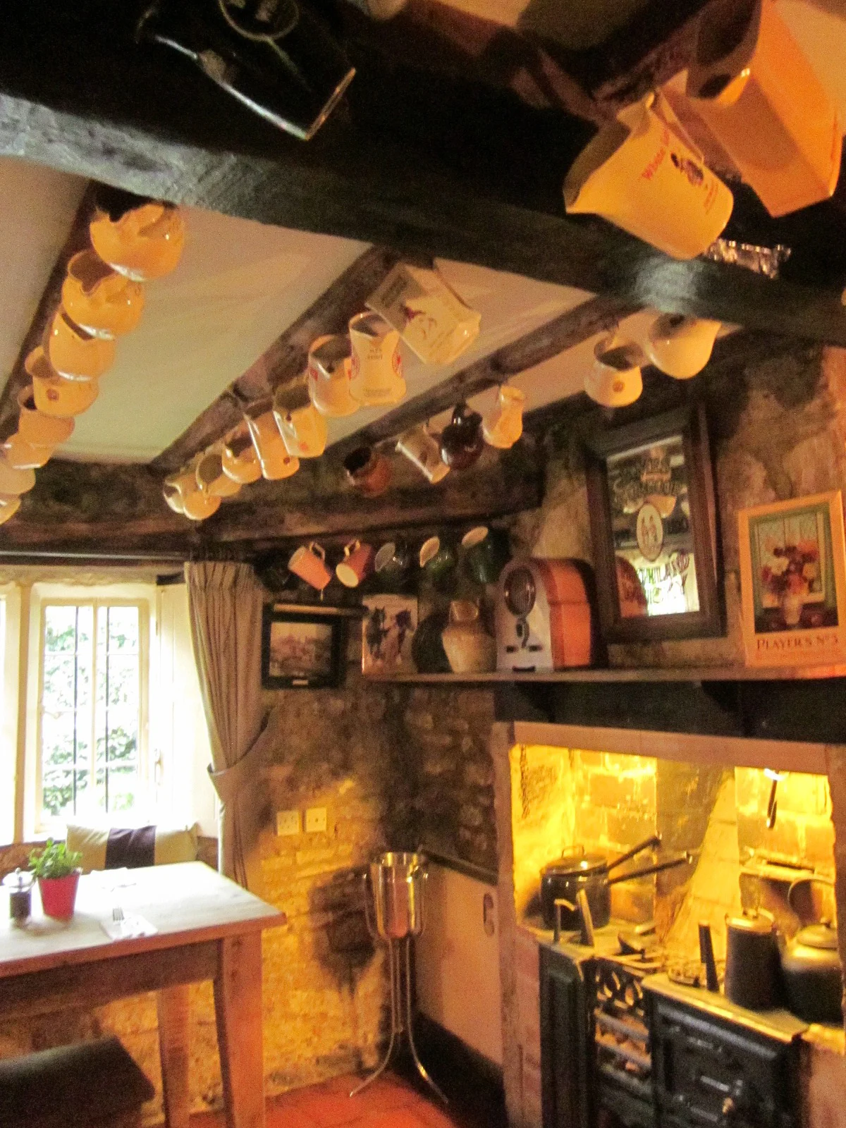 Personal mugs on the ceiling of the Falkland Arms pub. (A matter of hygiene at one time...?)