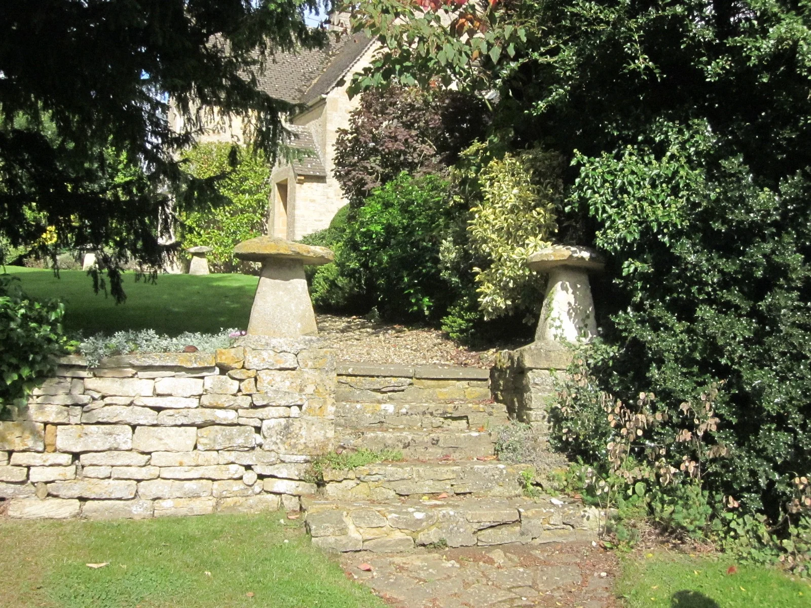 Staddle stones, used as ornamentation. Originally, these were used as supports to hold granaries off the ground to protect from vermin and "the damp."