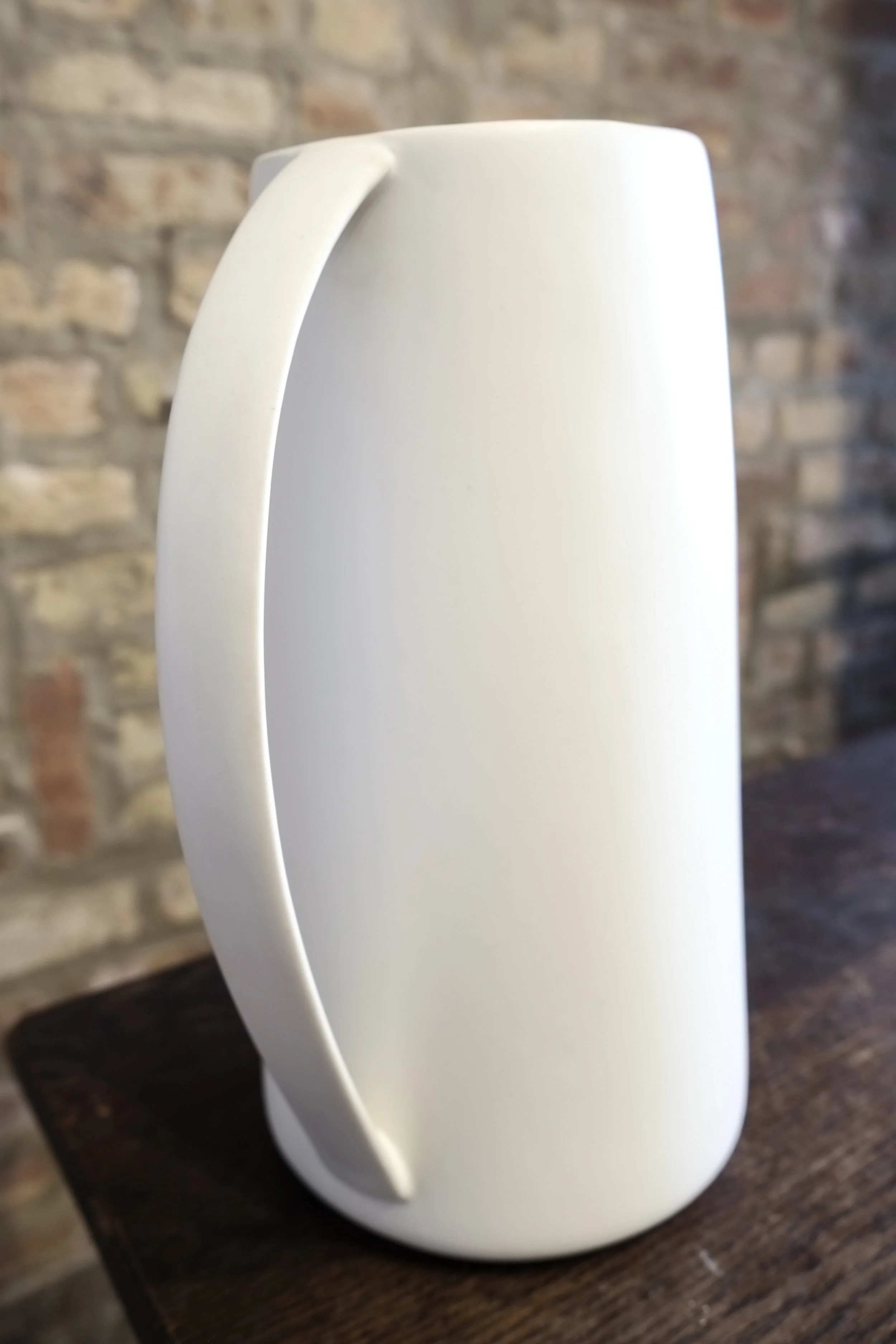 Reyaz Pitcher white
