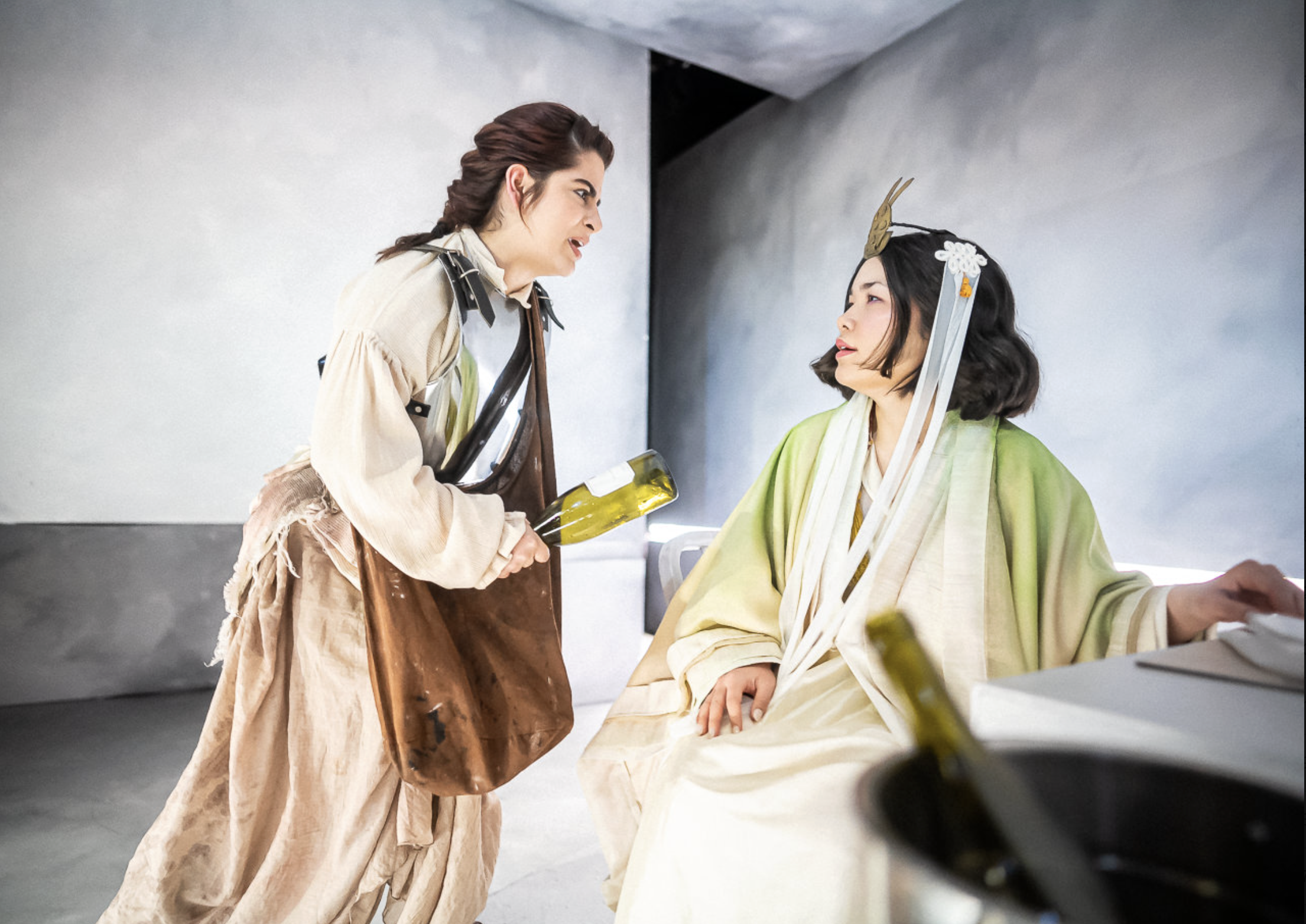  “My favorite, however, are the costumes in the first act, thanks to Anna Wooden and Anna Finerty. The ingenuity involved in creating a female Pope outfit, the knight garb worn by Dull Gret, and the flowy gowns worn by the other guests is no less tha