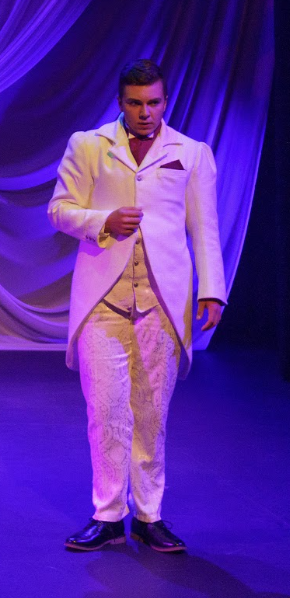  White cutaway coat, made to hold up under multiple washings because there was a lot of blood. Designed by Eloin Voegeli. 