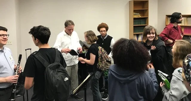 Eau Gallie High School music students speaking with members of the GPF Trio following their outreach event in April 2019.