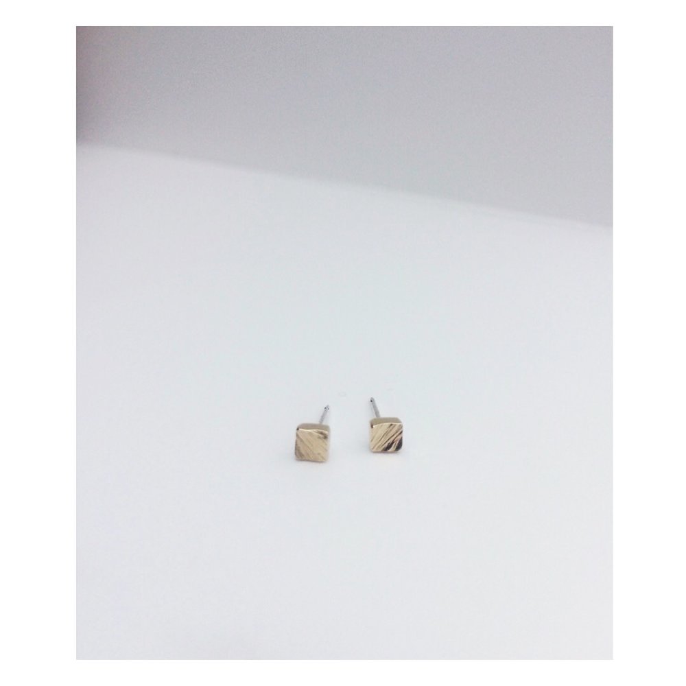  recycled gold studs to match a custom wedding ring 