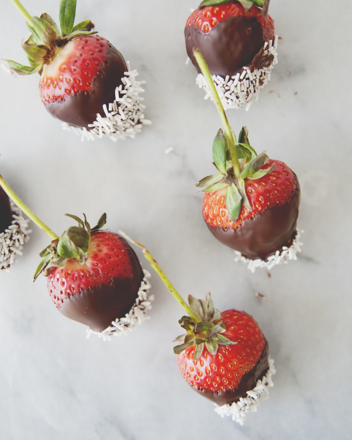 chocolate dipped strawberries with white chocolate sprinkles