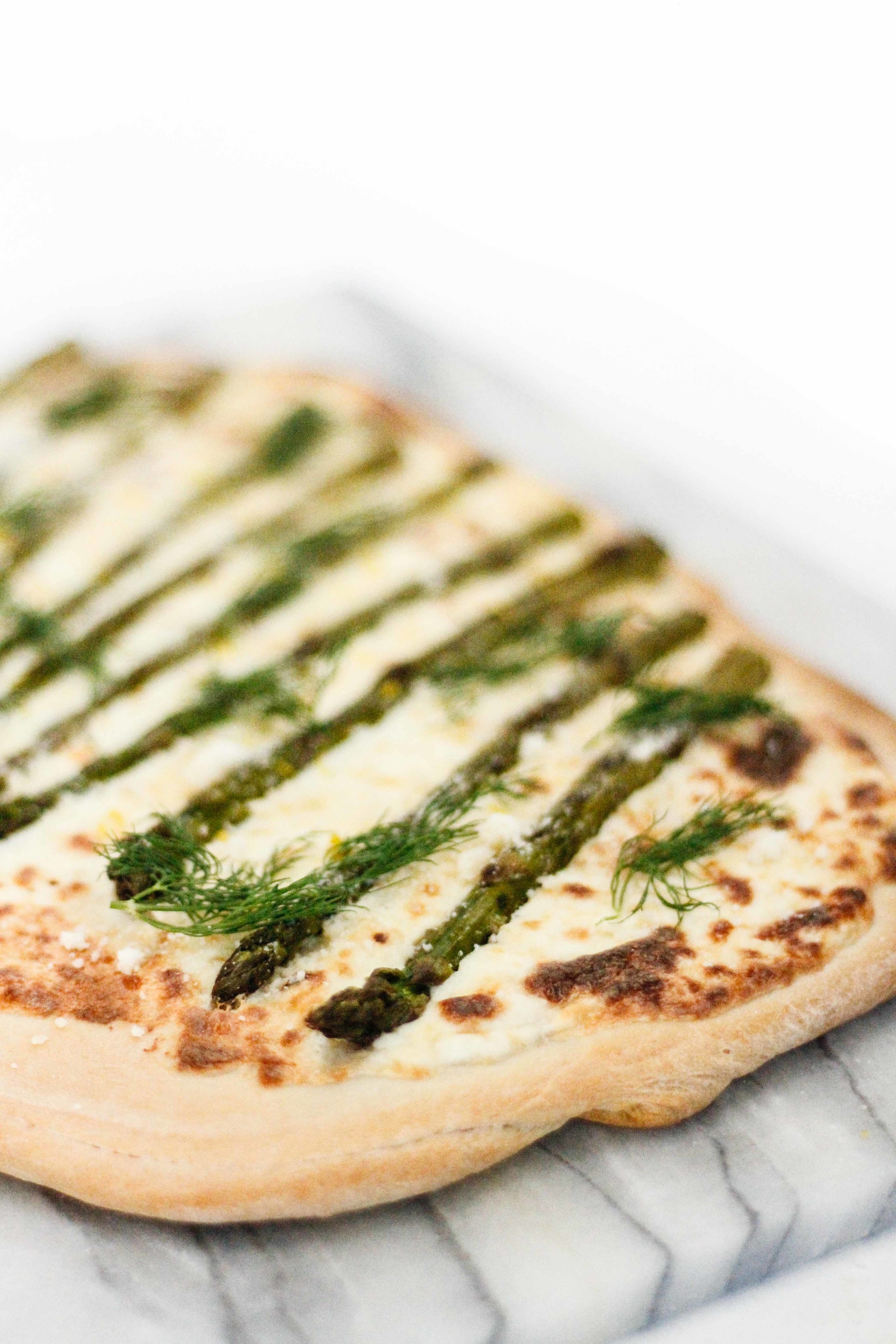 Spring pizza with asparagus and lemon