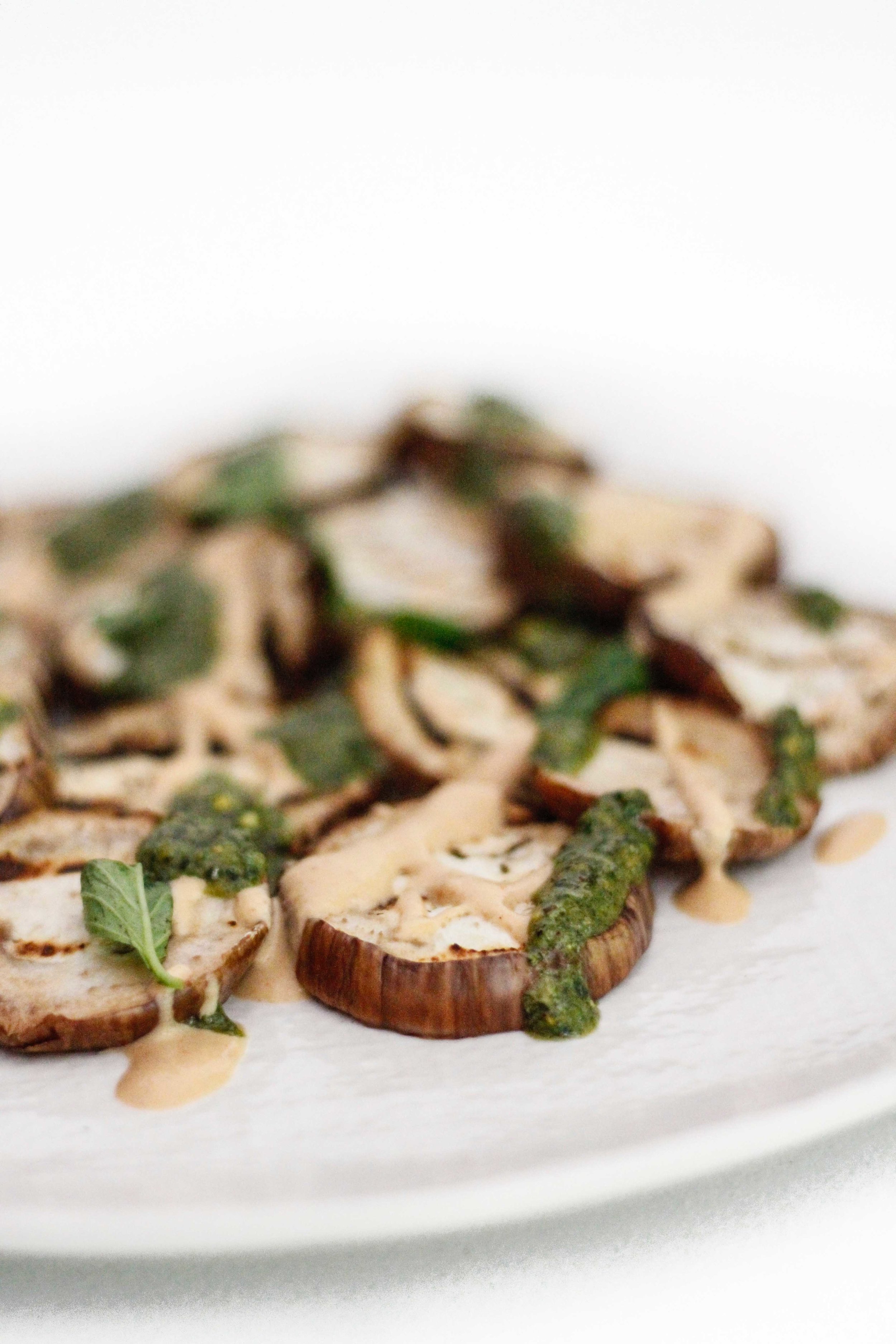 Grilled eggplant with spicy tahini and pesto