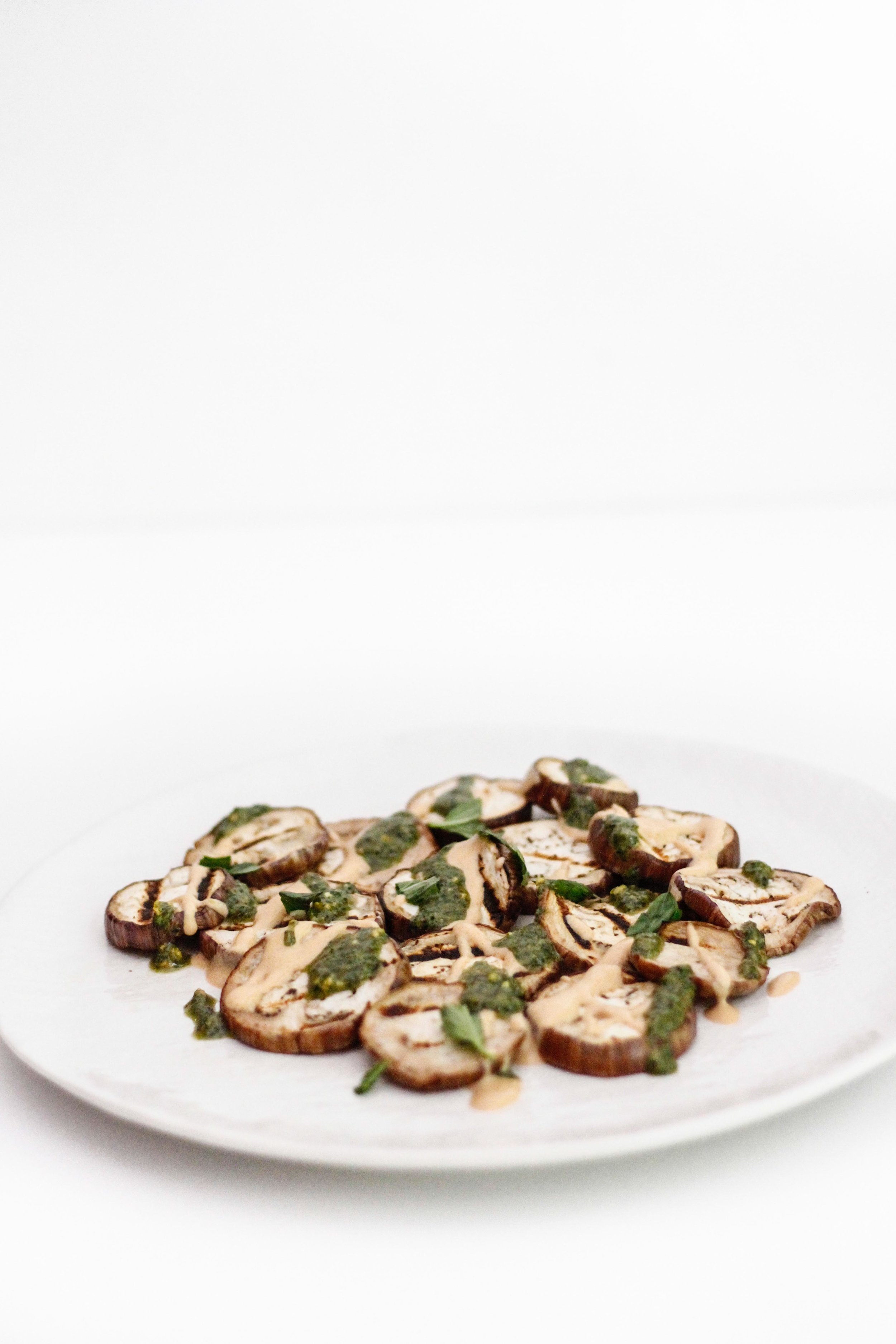 Grilled eggplant with spicy tahini and pesto