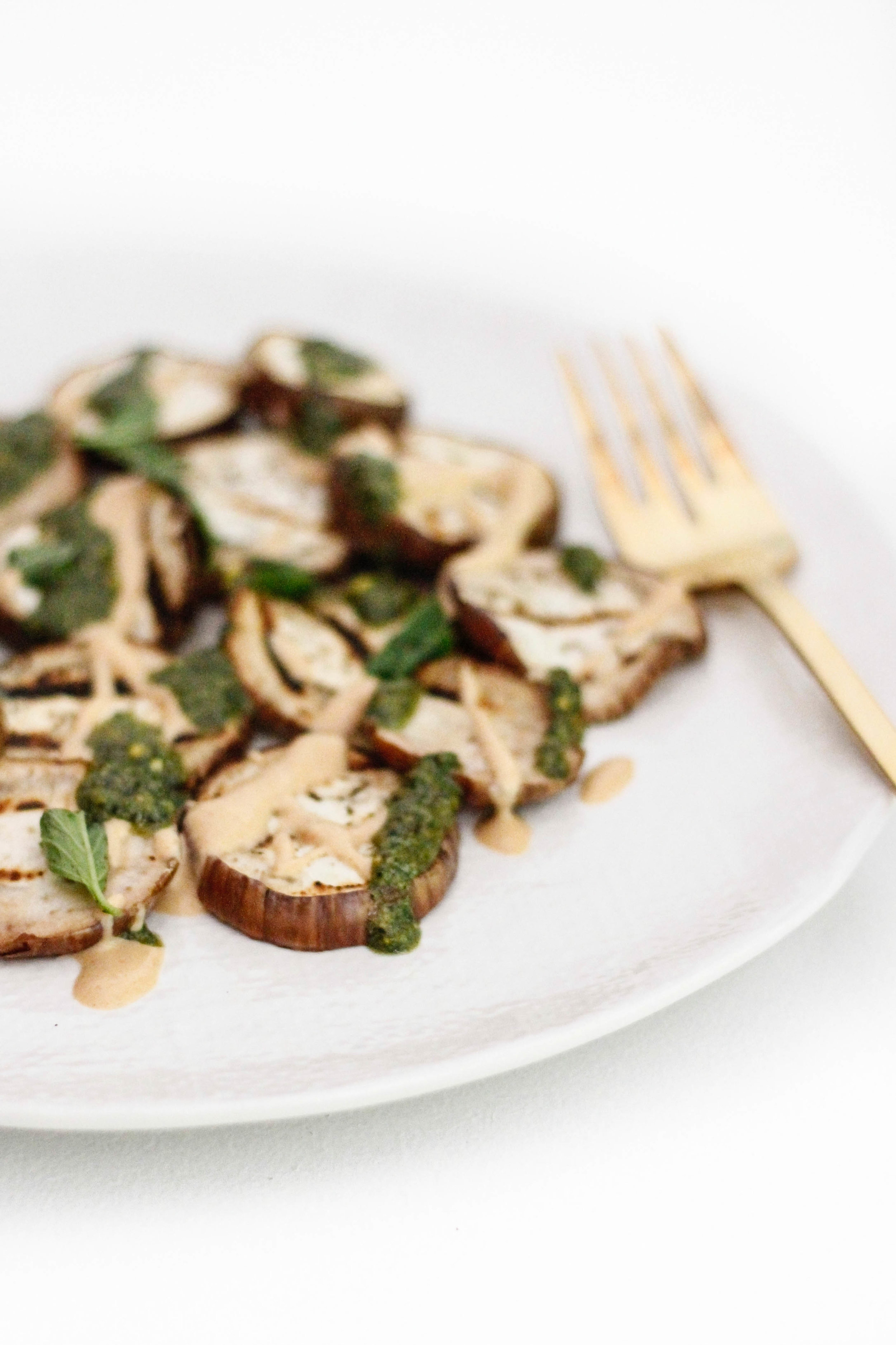 Grilled eggplant with spicy tahini and pesto