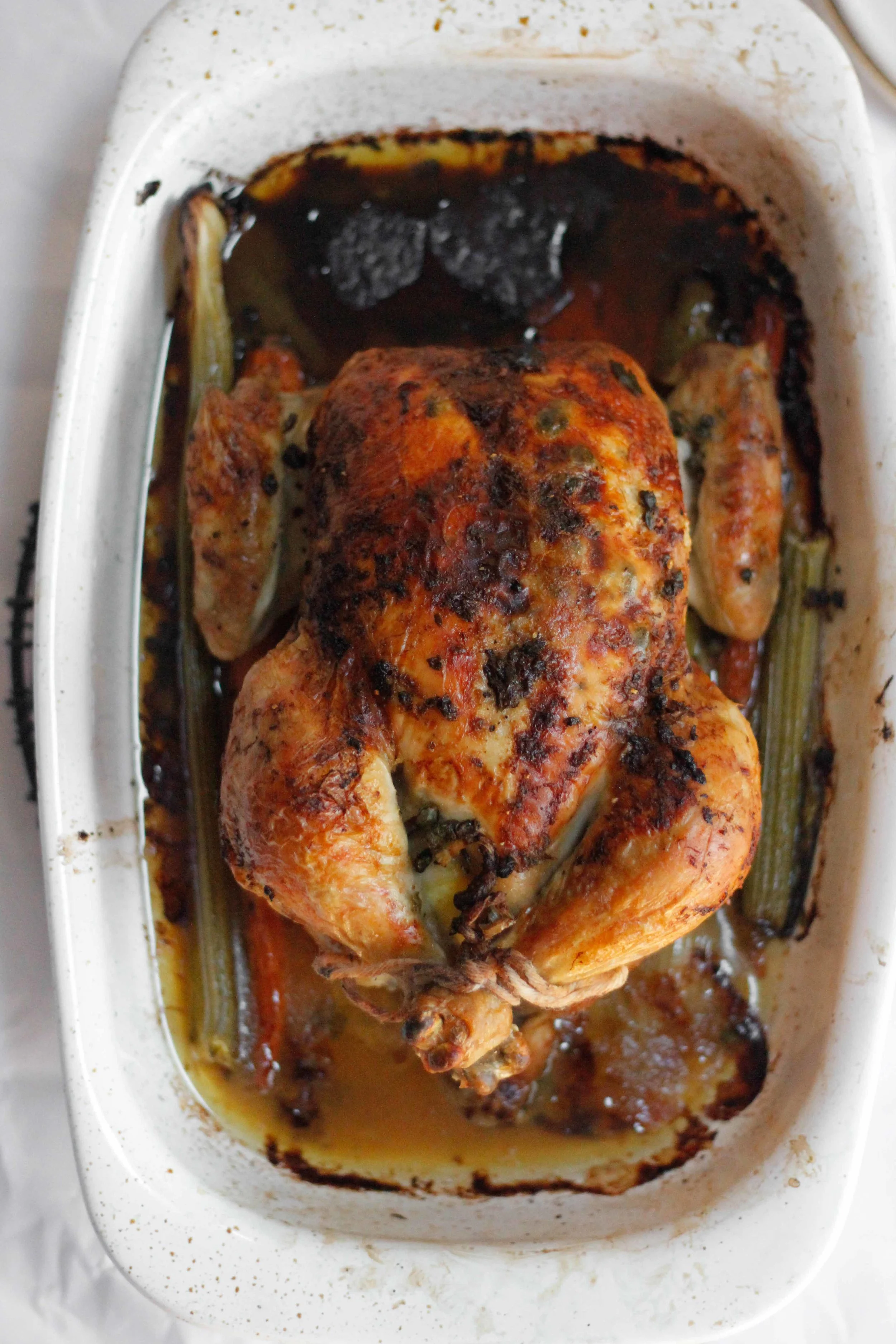 Whole roasted lemon caper chicken