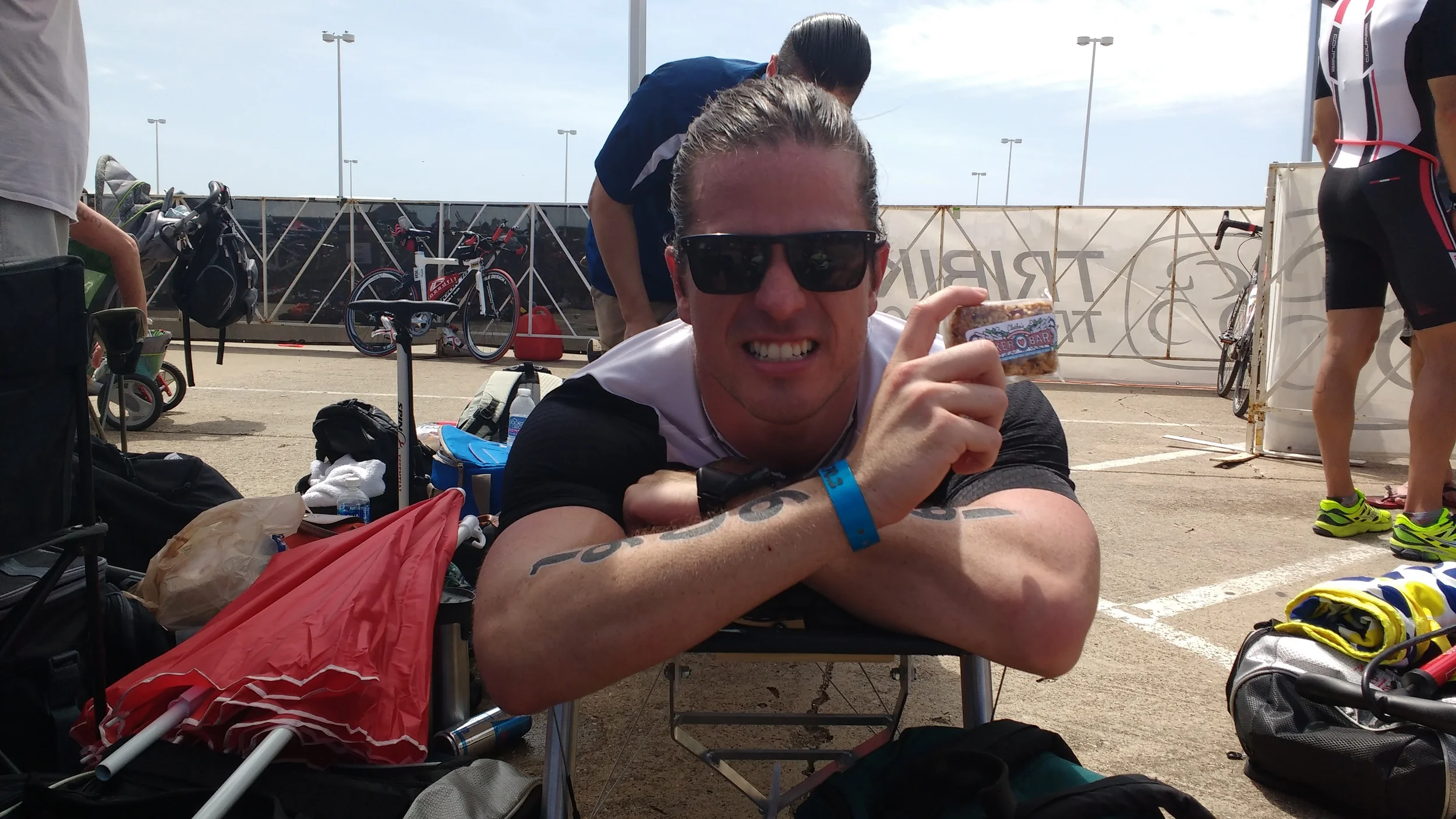 Dario from Houston on the table after finishing Ironman Texas 70.3 in Galveston. Dario's bars of choice....Nuts and Bolts and The Biker Bar. He survived a bike crash and still went on to finish strong!