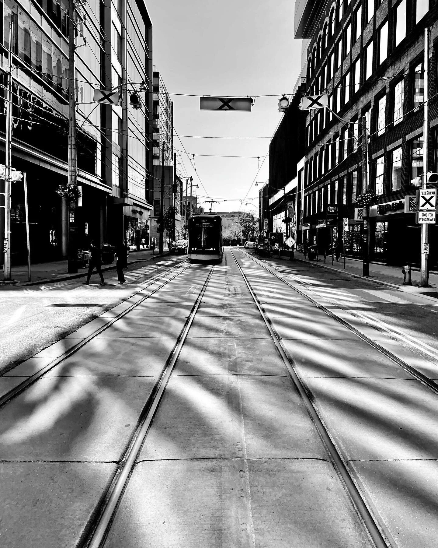 With each day that passes, the sun is tracking lower and lower on the horizon. While this means that our days are shorter, it also means that reflections and shadows in the urban landscape are longer, causing them to interweave in more interesting wa