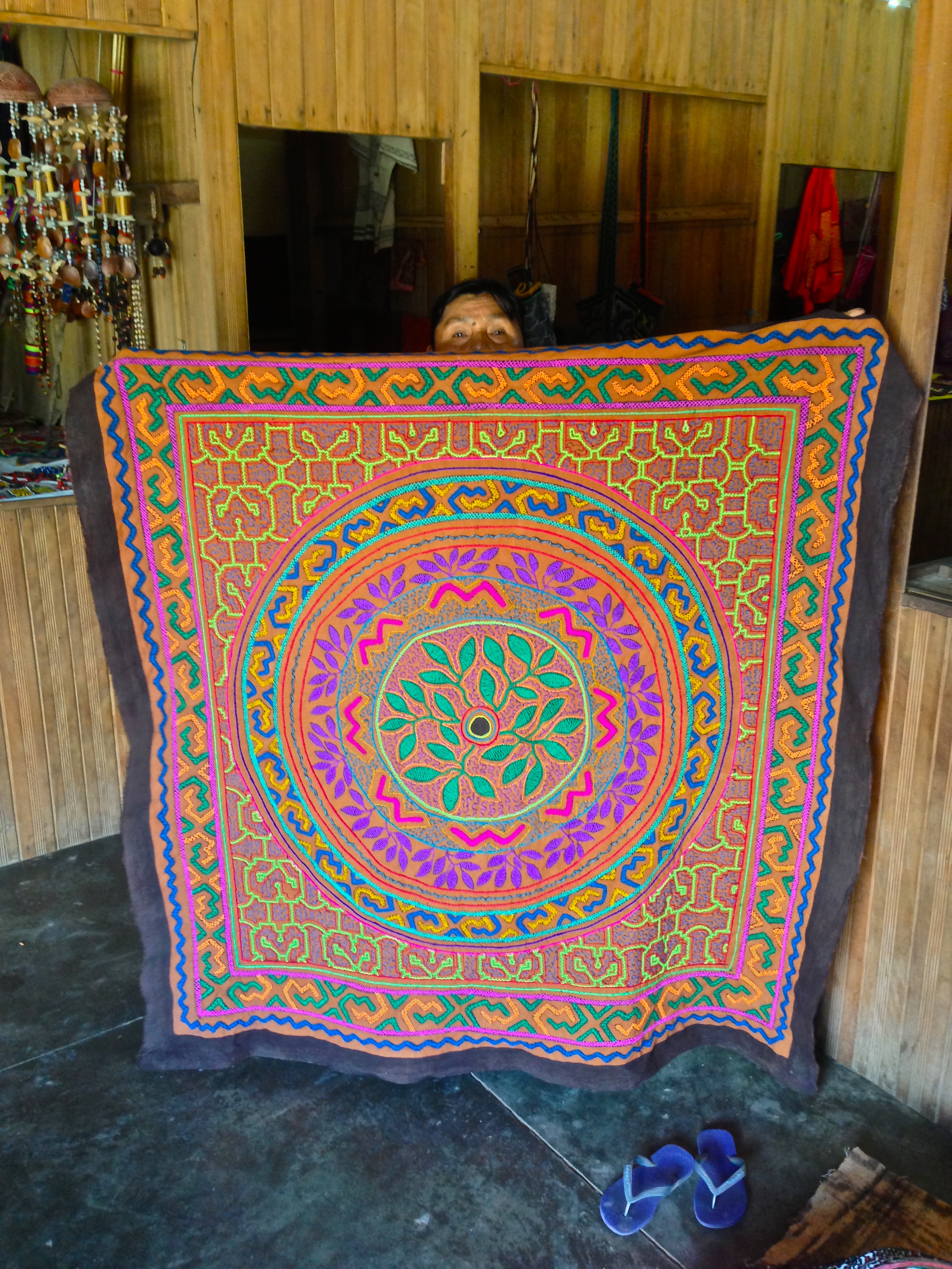 Shipibo artist displaying her work in Pucallpa, Peru