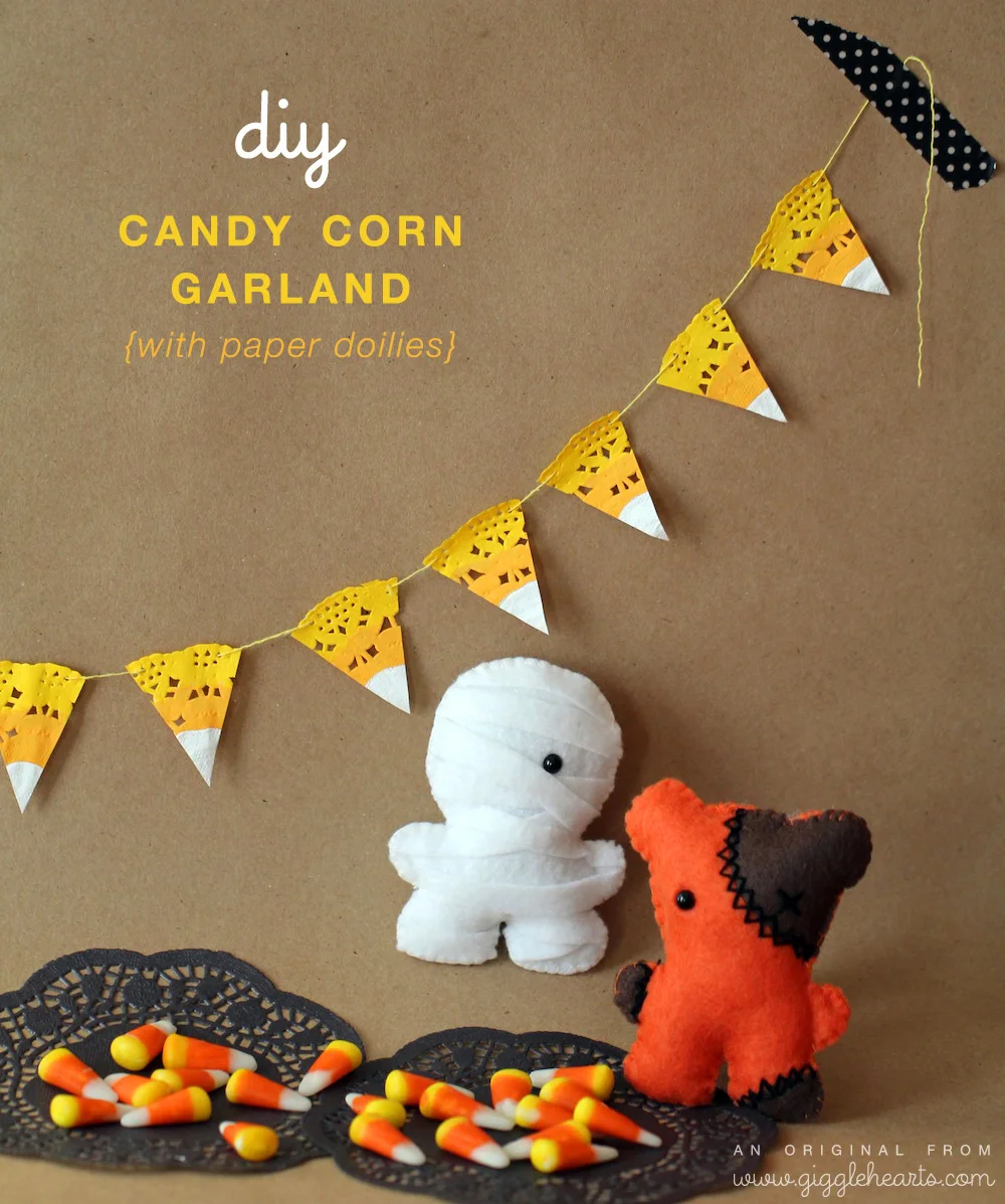DIY Candy Corn Garland : created with paper doilies and featuring Squatles {sweet little felt creatures} / from www.GiggleHearts.com