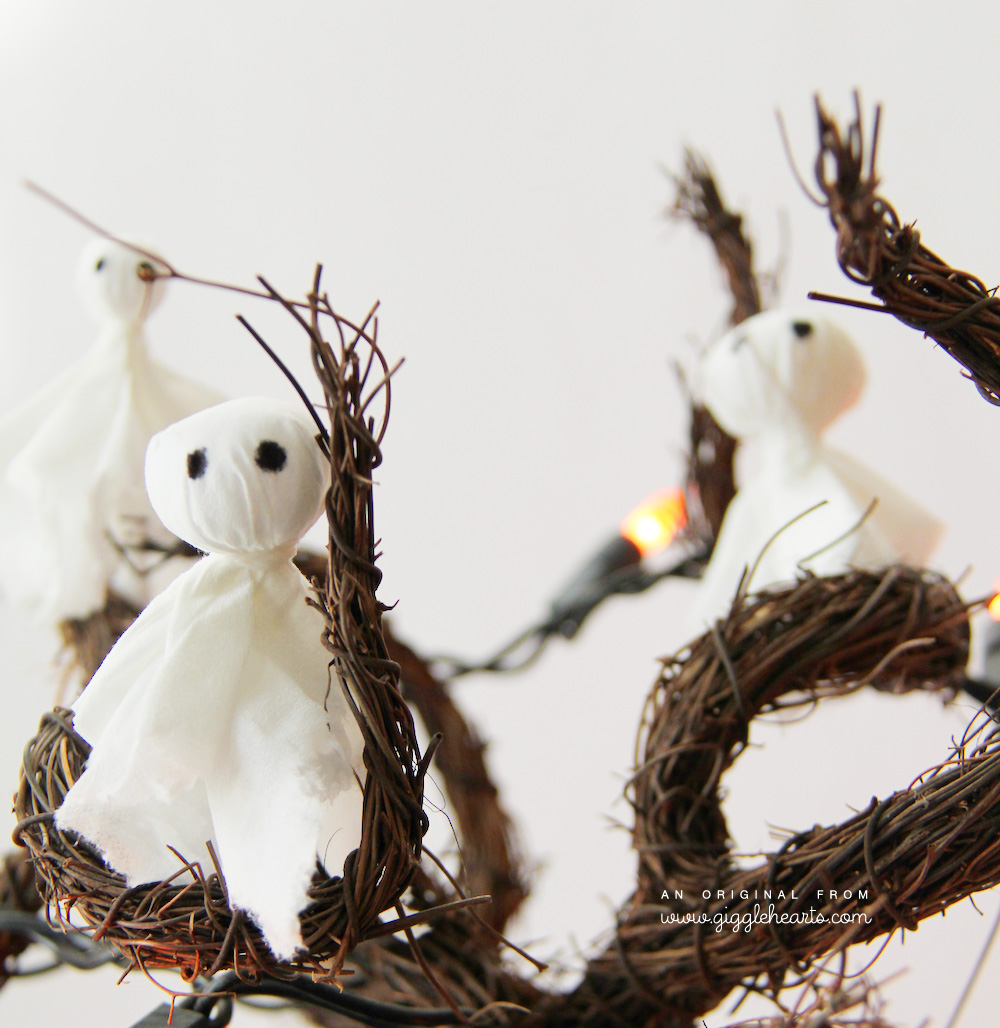 DIY Tissue Ghosts for Halloween : made with 4 supplies . . . tissues, pom poms, rubber bands and a black permanent marker / as seen on www.GiggleHearts.com