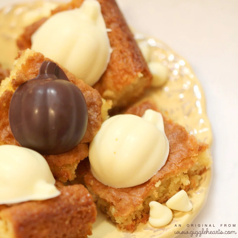 Delicious Fudge-Like White Chocolate Brownies Recipe {topped with homemade Chocolate Pumpkin Candy} / as seen on www.GiggleHearts.com