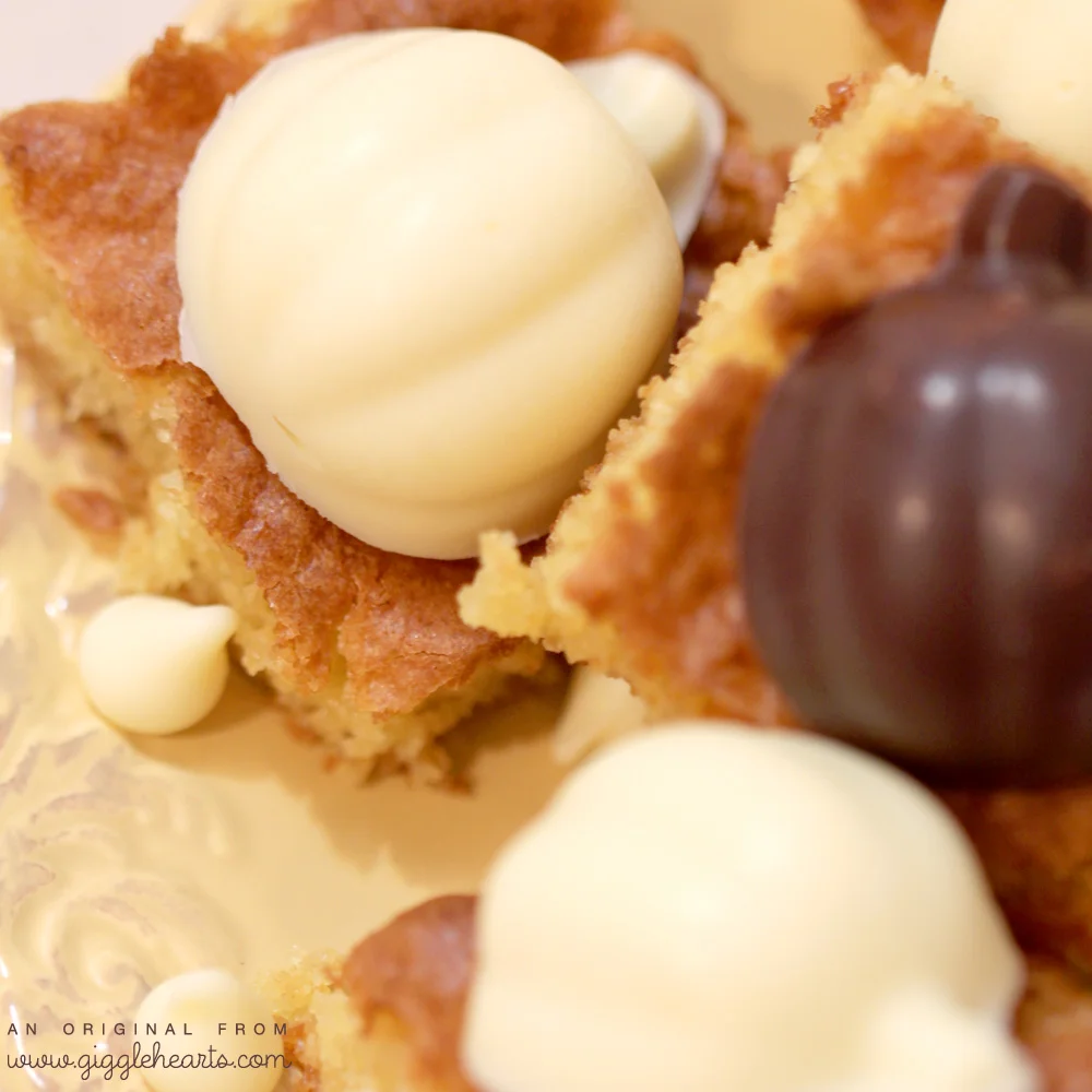 Gluten Free White Chocolate Brownies Recipe {topped with homemade Chocolate Pumpkin Candy} / as seen on www.GiggleHearts.com #glutenfree #brownies