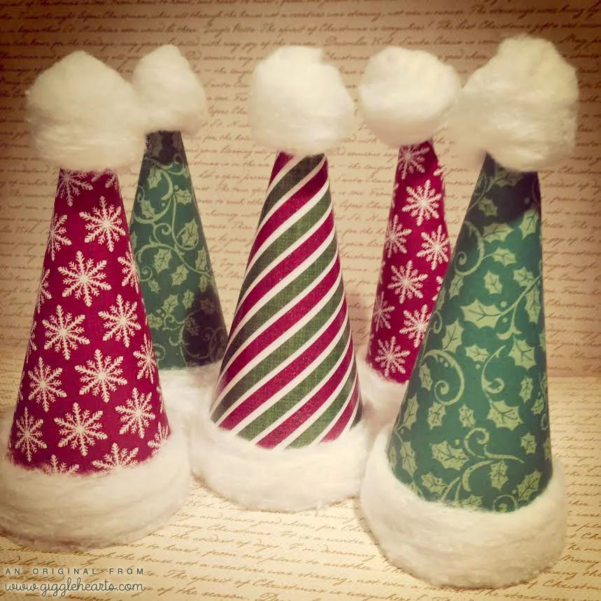 DIY Paper Santa Hats with Cottonballs - a quick and easy craft to do with the kids / as seen on www.GiggleHearts.com