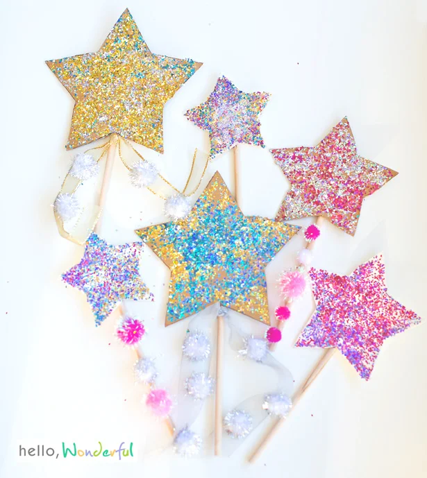 DIY Glitter Star Wands for Ringing in the New Year / as seen on Hello Wonderful / shared on www.GiggleHearts.com