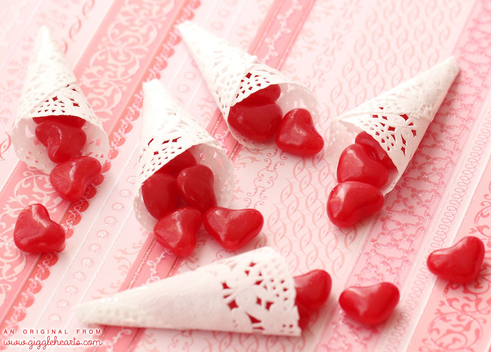 Click to Find out how to make Paper Cones for Valentine's Day and fill with candy hearts or confetti / Valentine’s Day Crafts and fun party favors / As seen on Giggle Hearts www.GiggleHearts.com