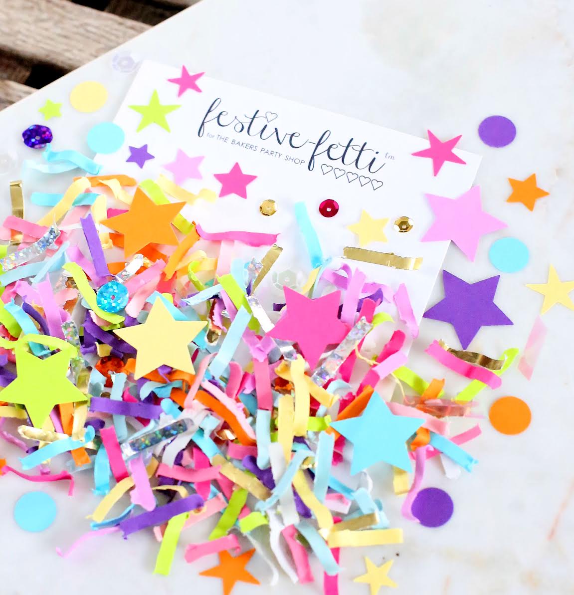  Colorful Unicorn Must-Have Party Items for a Perfectly Styled Unicorn Theme Dessert Table - Unicorn Festive Fetti Confetti with Stars - from The Bakers Party Shop - see more on www.GiggleHearts.com 