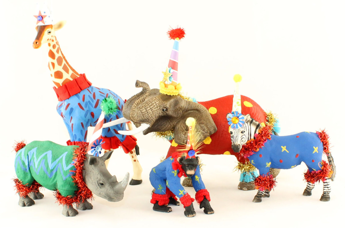 A Parade of Circus Cake Toppers