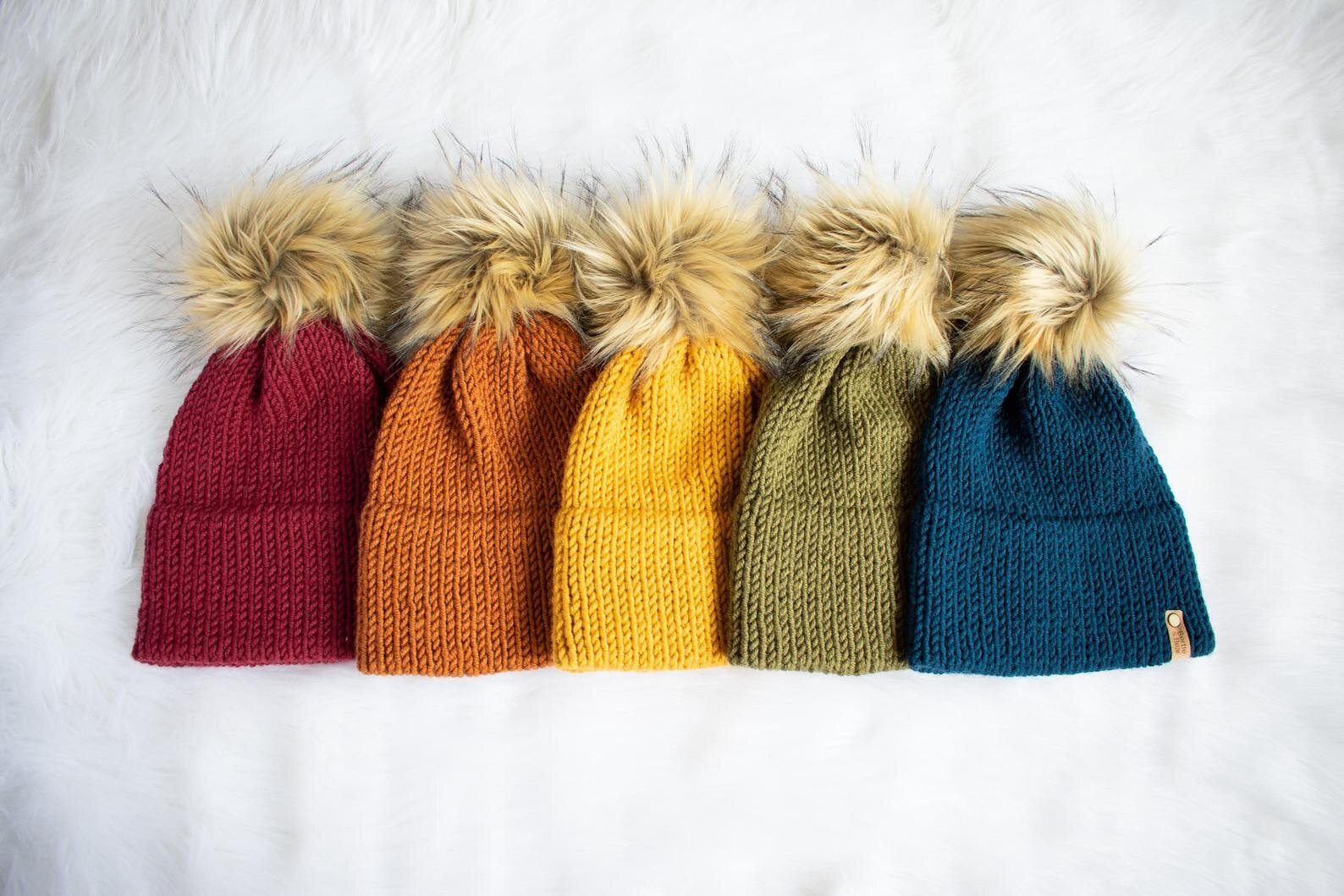 Bertie and Bear Knits creates the cutest handmade hats with faux fur poms.
