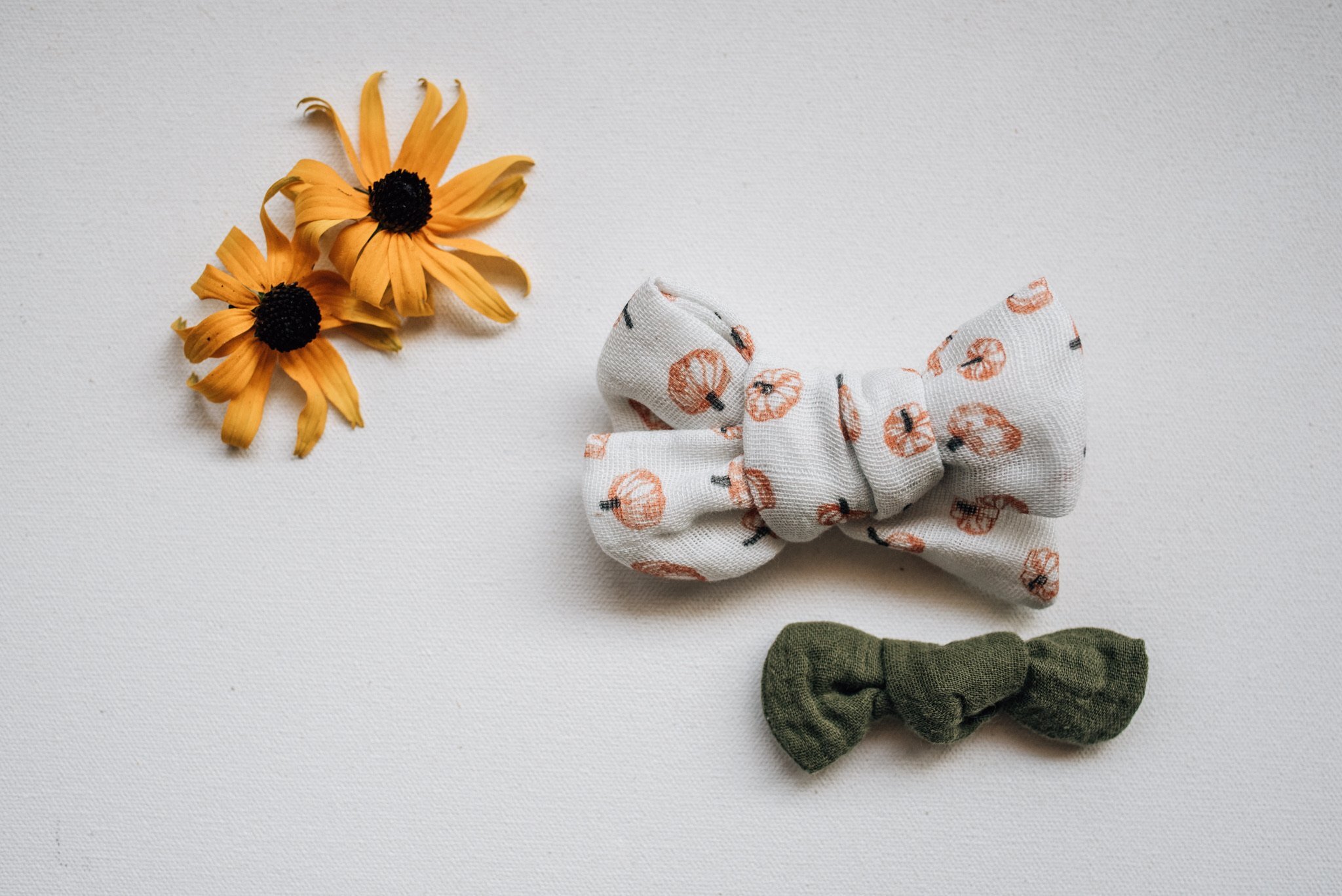 Little Ellie Co creates handmade bunny loveys + bows for your little one.