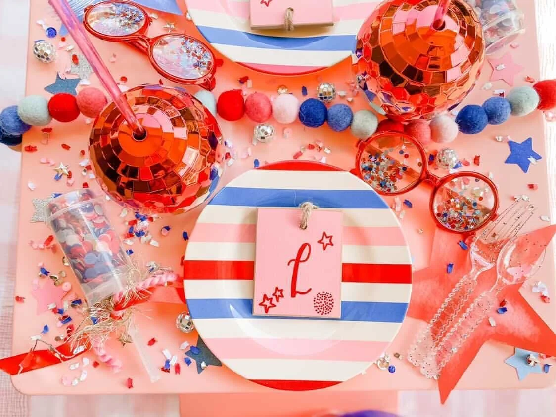 The Key Elements to a Patriotic Tablescape include Stars, Stripes, Disco Balls and Monograms