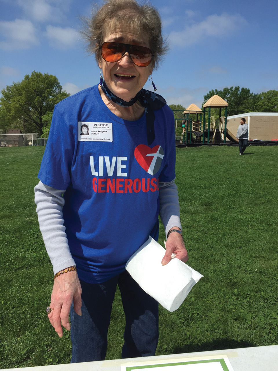  Joan Wagner braving sun and wind on Earth Day. 