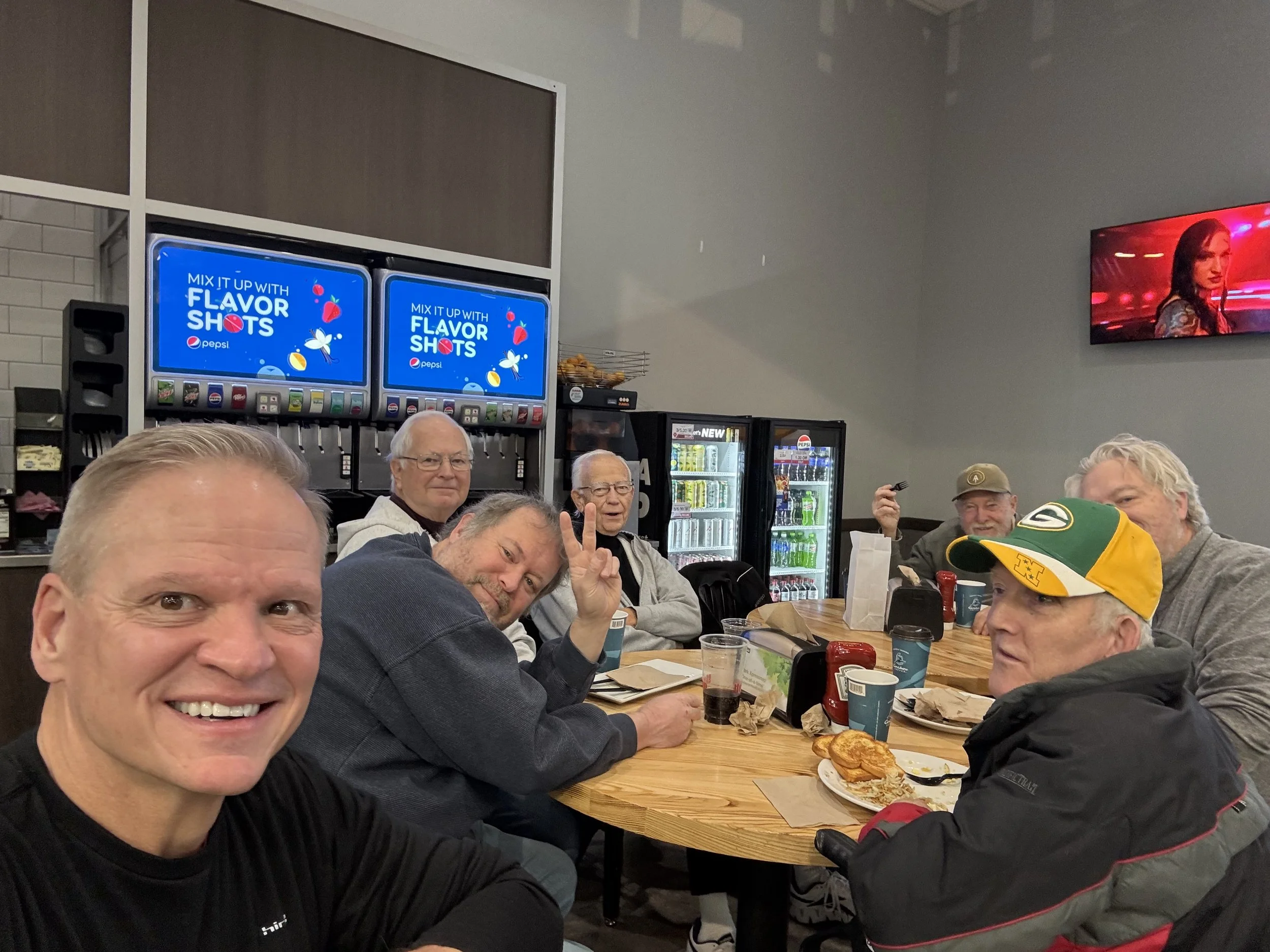 Men's Group Having Breakfast