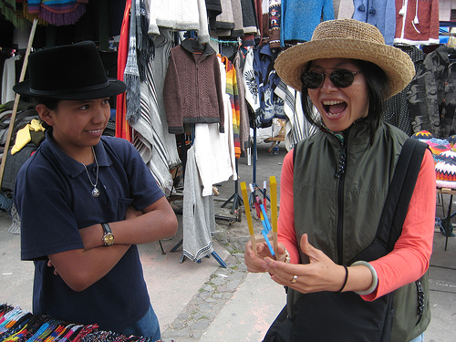 Haggling at a market in Baños, Equador