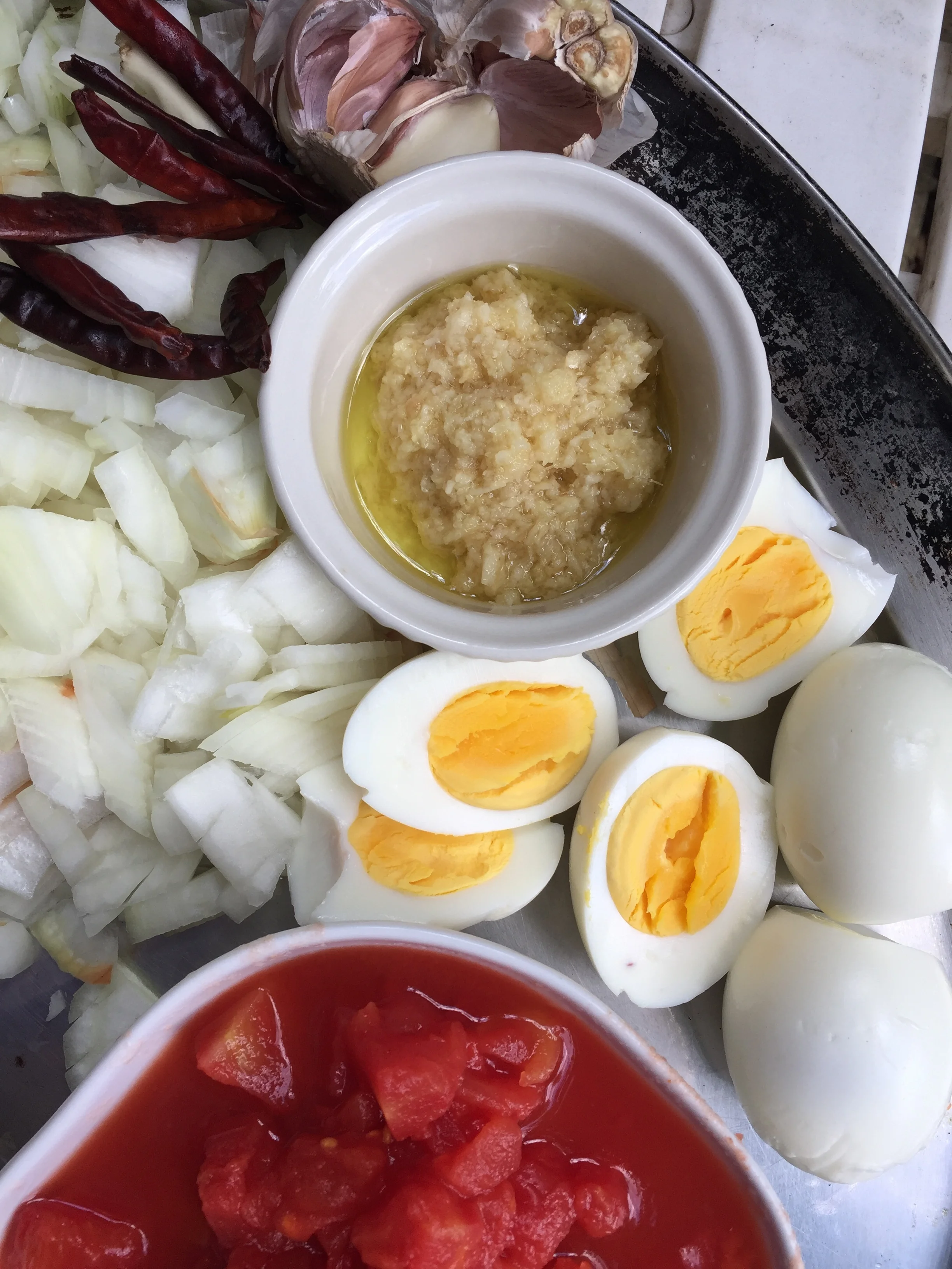 Hard boiled eggs, vine ripened tomatoes.
