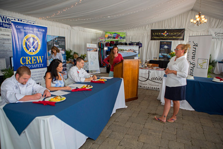 Crewmembers onboard participating yachts at the 2015 Newport Charter Yacht Show are judged for best charter chef. (Photo Credit Newport Charter Yacht Show/Billy Black). 