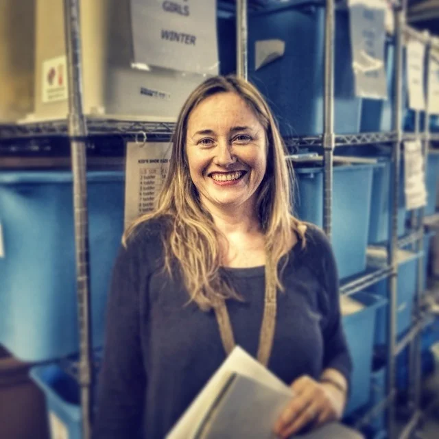 Founder Sandie Trombert in the old Little Essentials warehouse in 2014