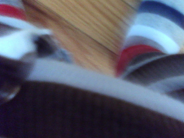 "Frame 0077". Mismatch. Striped pajamas and socks. 2011