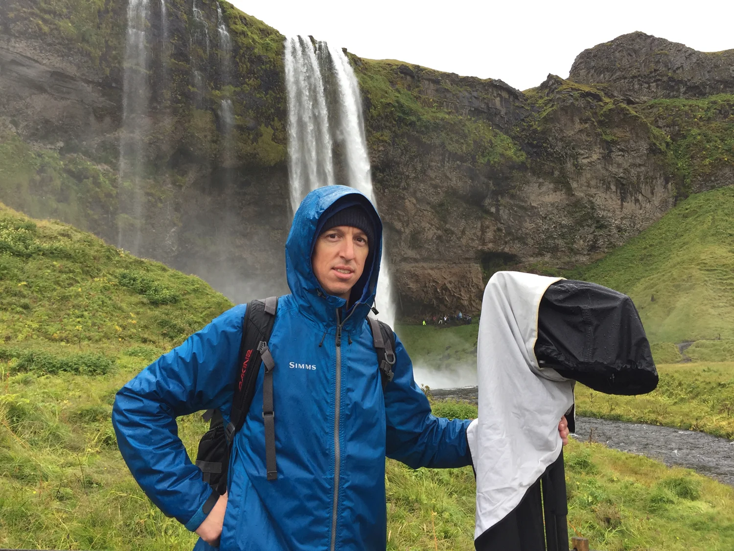 If you look behind me, you'll notice a LOT of wet tourists. I was a dry tourist, but I used the hill in the foreground to hide those tourists, and balance my composition of the falls.