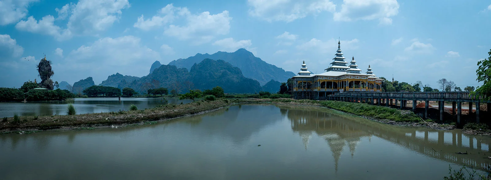 The mountain in the middle of the picture (the tallest peak) is the mountain we climbed. To the left you can see an epic balancing rock with a temple on the top and to the right another large temple. 