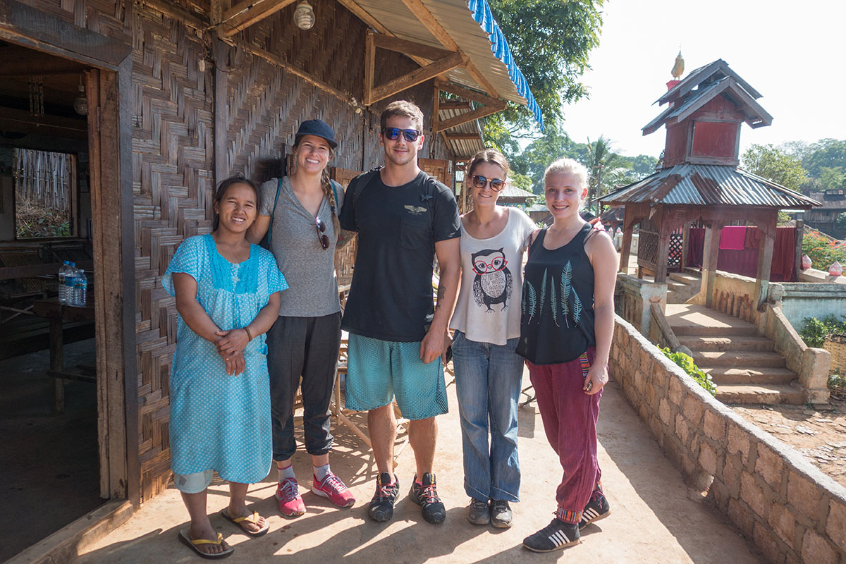 Our trekking group and our host. She was 7 months pregnant and still carrying water from the well, cooking like crazy and picking tea in the fields. What a woman! 