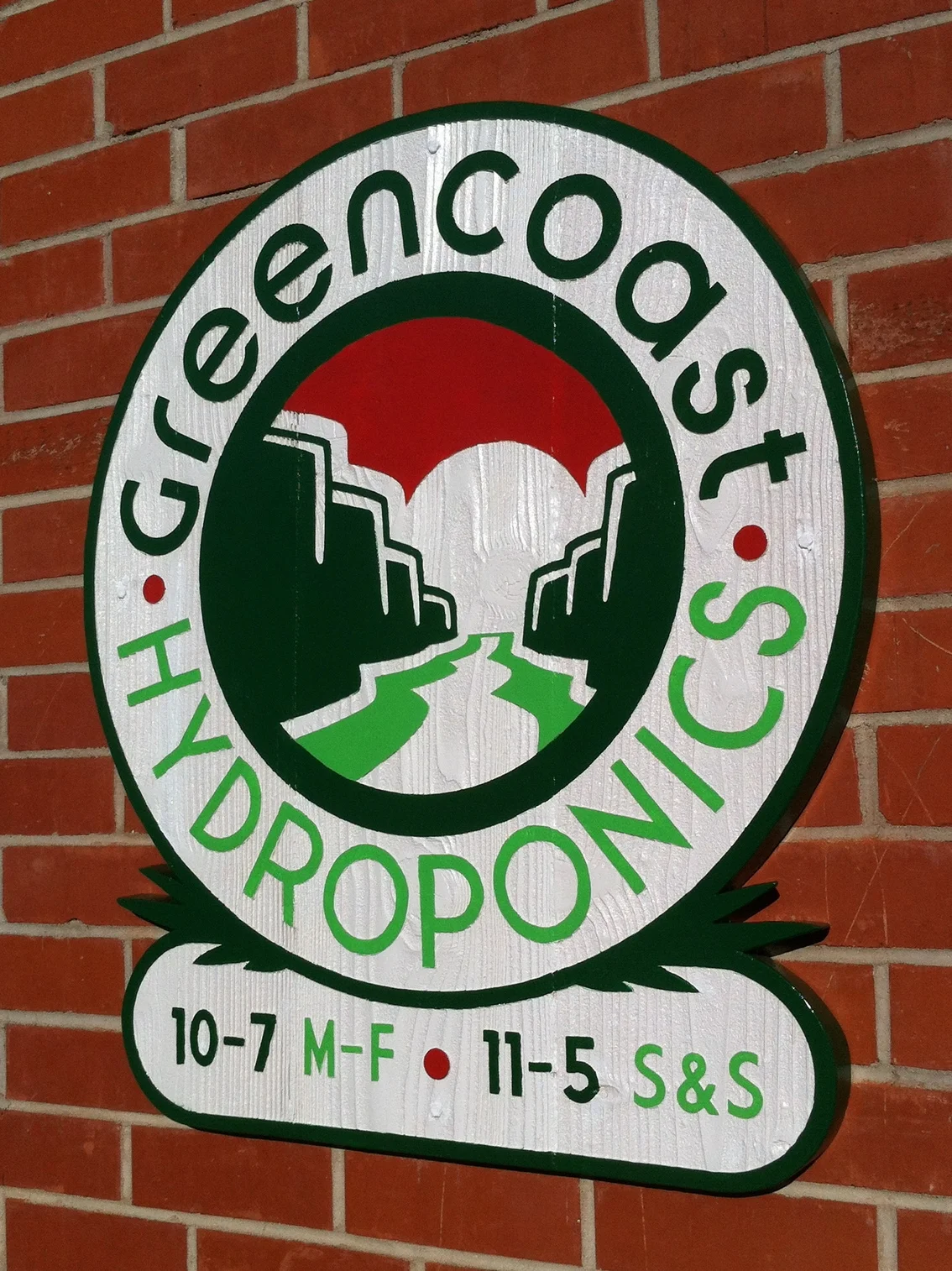 Green Coast Hours Sign